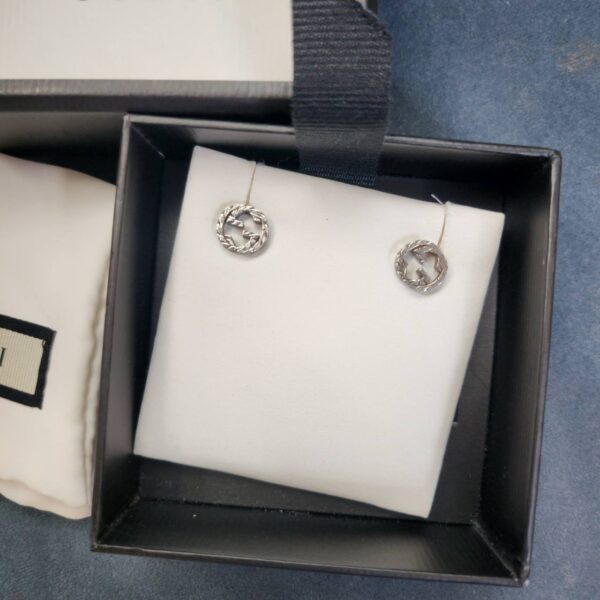 Used like new Gucci Earrings Icon Logo